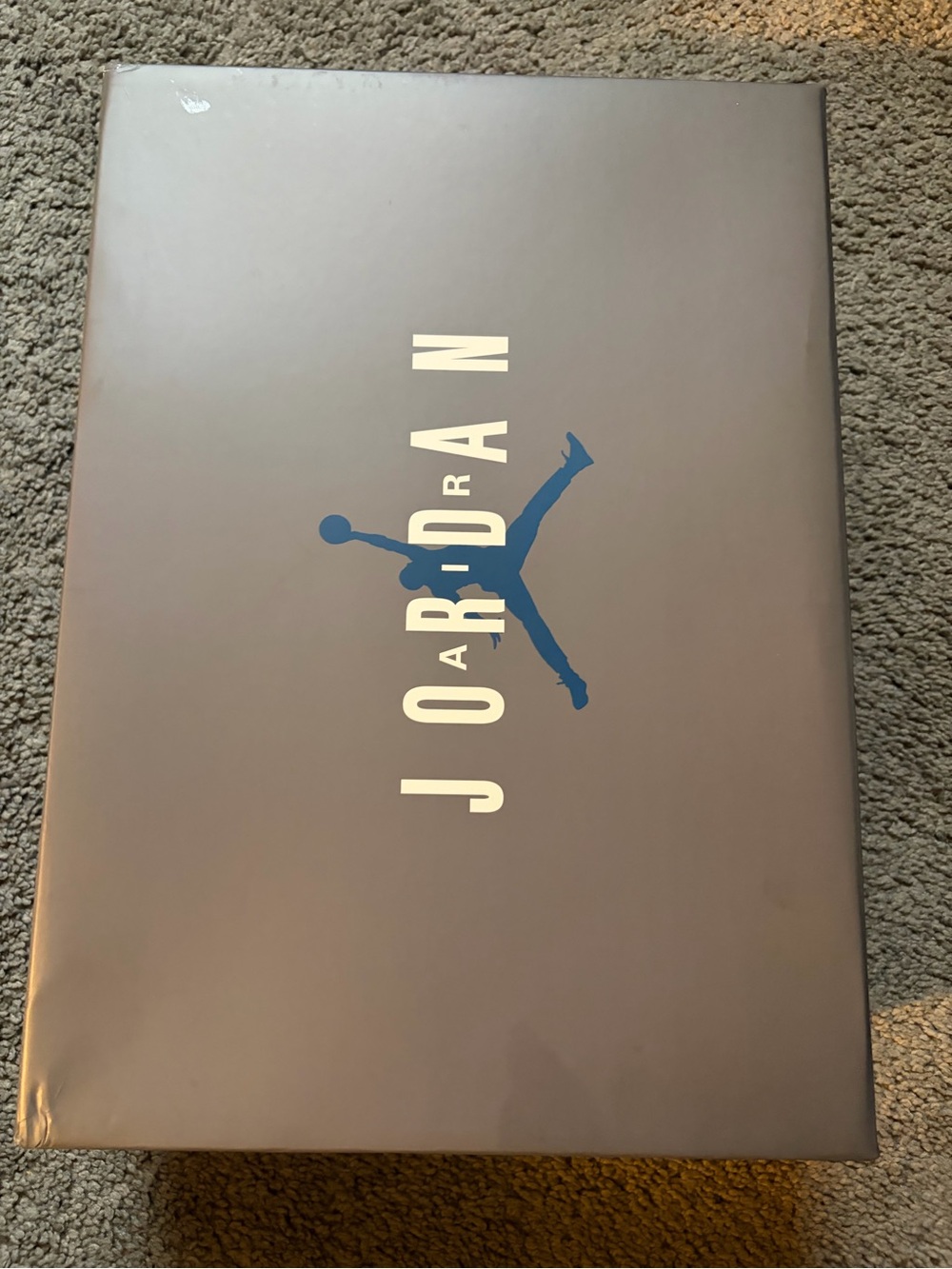 Jordan Blue Jumpman Wall Art on Gray Backdrop